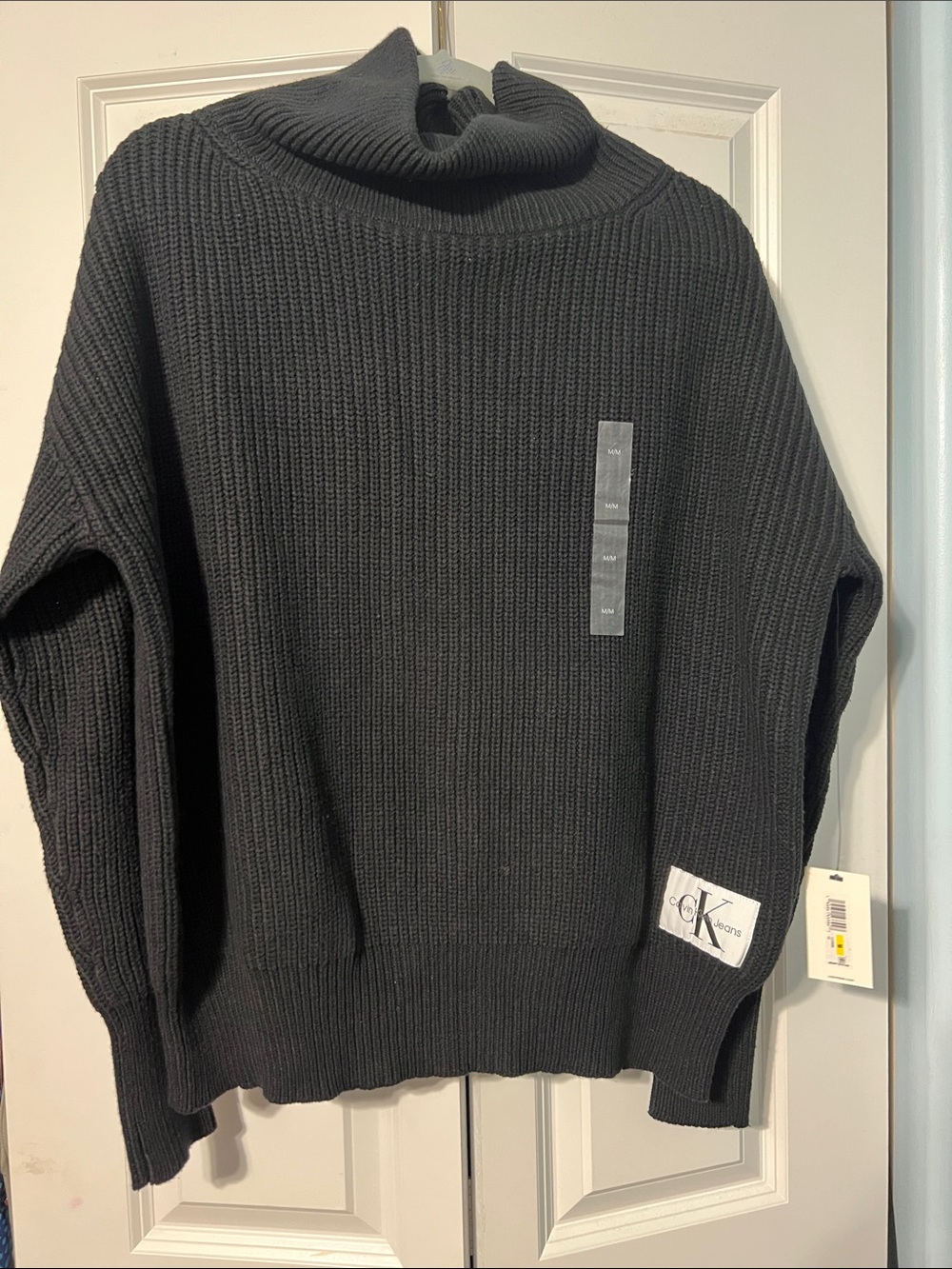 Calvin Klein mock neck sweater. Size M